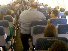 Air France обязала толстяков платить за перелет вдвое больше