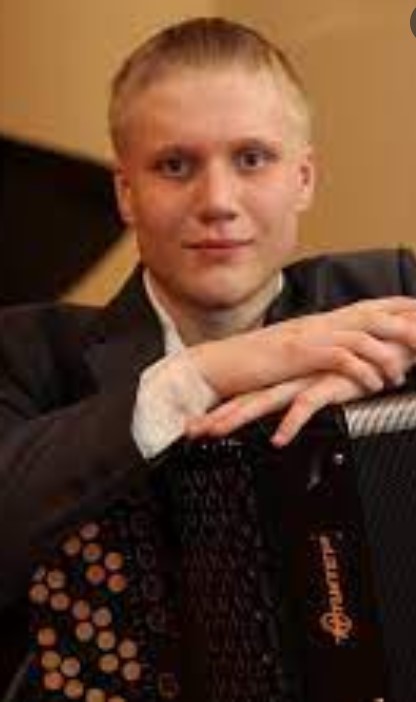 Александр Комельков